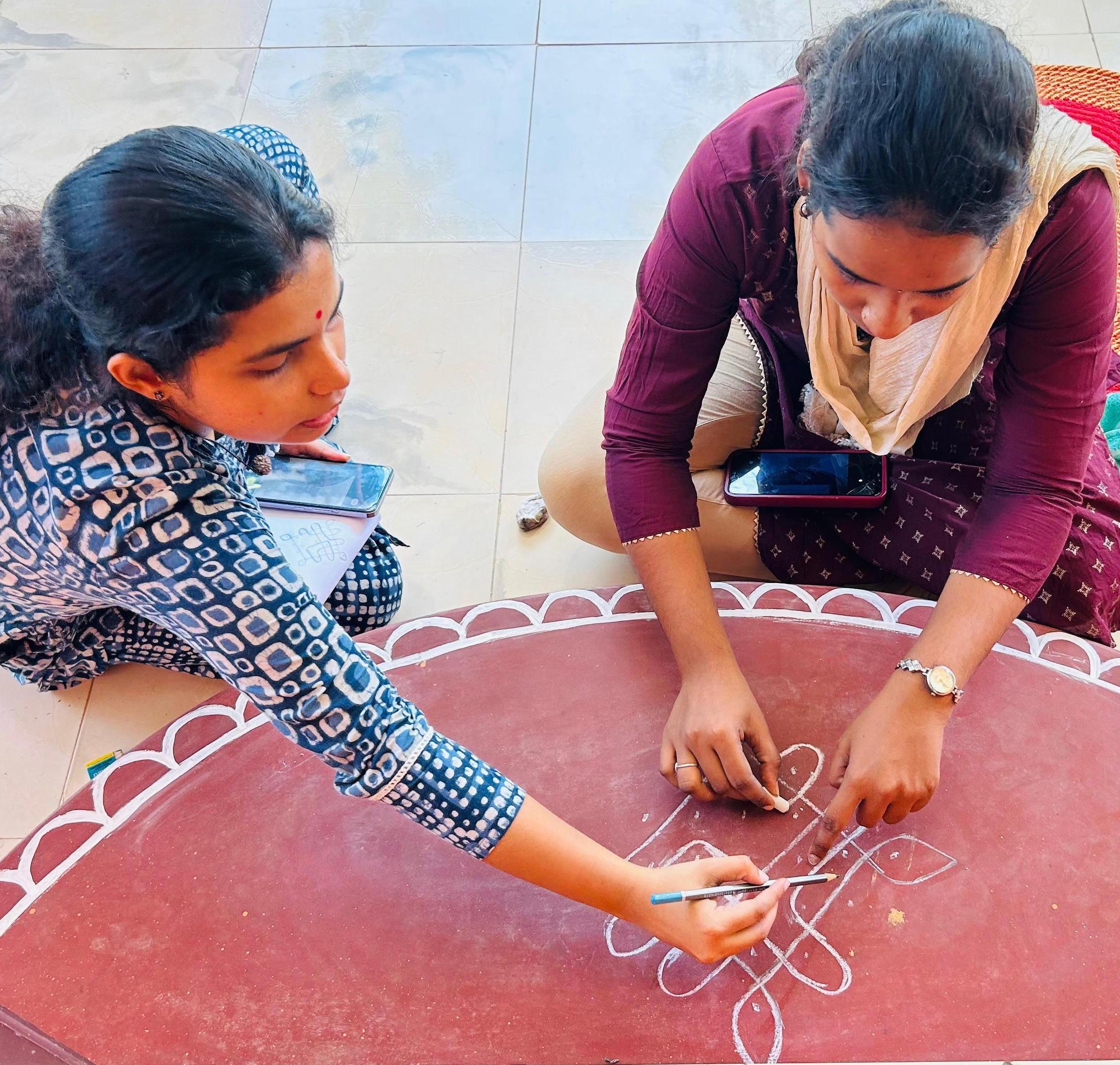 Drawing Rangoli on Inauguration day